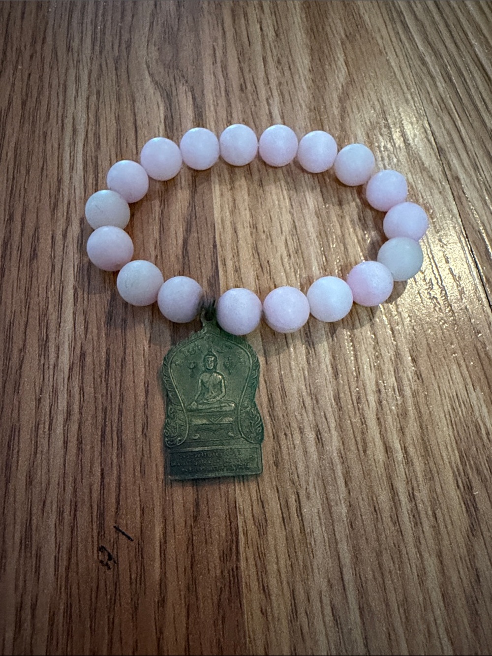 Pink Beaded Bracelet with Buddah Charm
